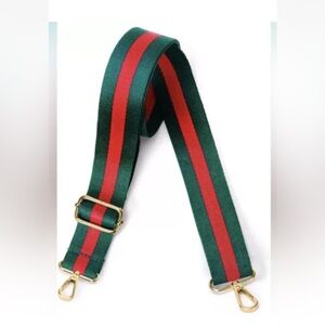 Red and green adjustable replacement bag strap with gold hardware. NEW